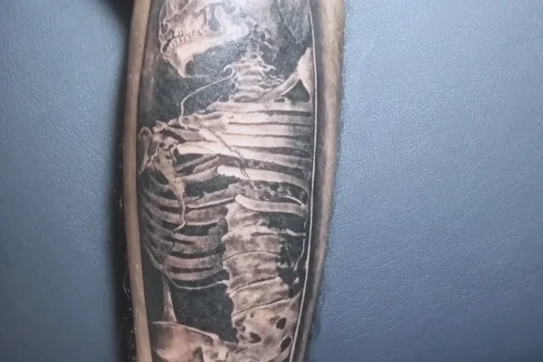 skeleton lower arm tattoo