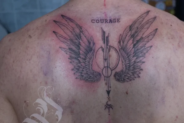 angel wings back tattoo with ornament