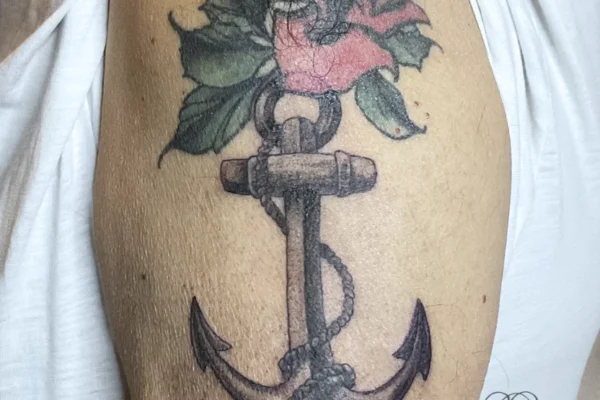 old school color tattoo with rose and anchor