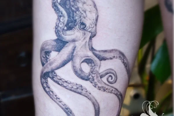 realistic octopus leg tattoo